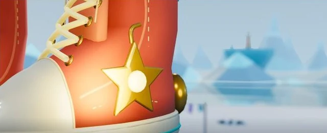 A close-up of Lacey: a red canvas high-top with cream laces and a gold star badge, standing in the snow.